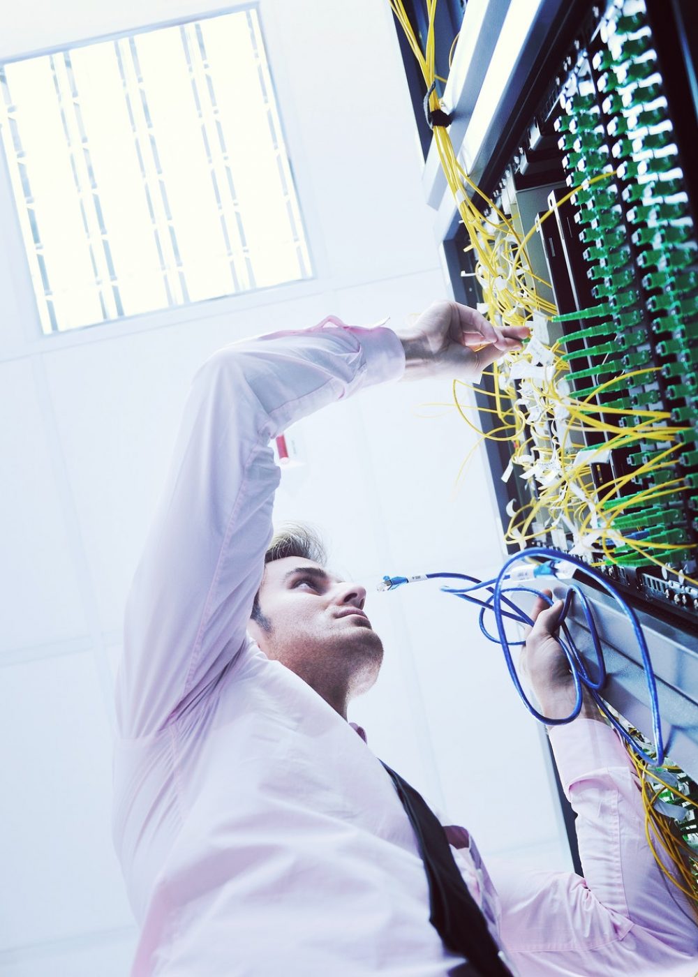 young it engeneer in datacenter server room